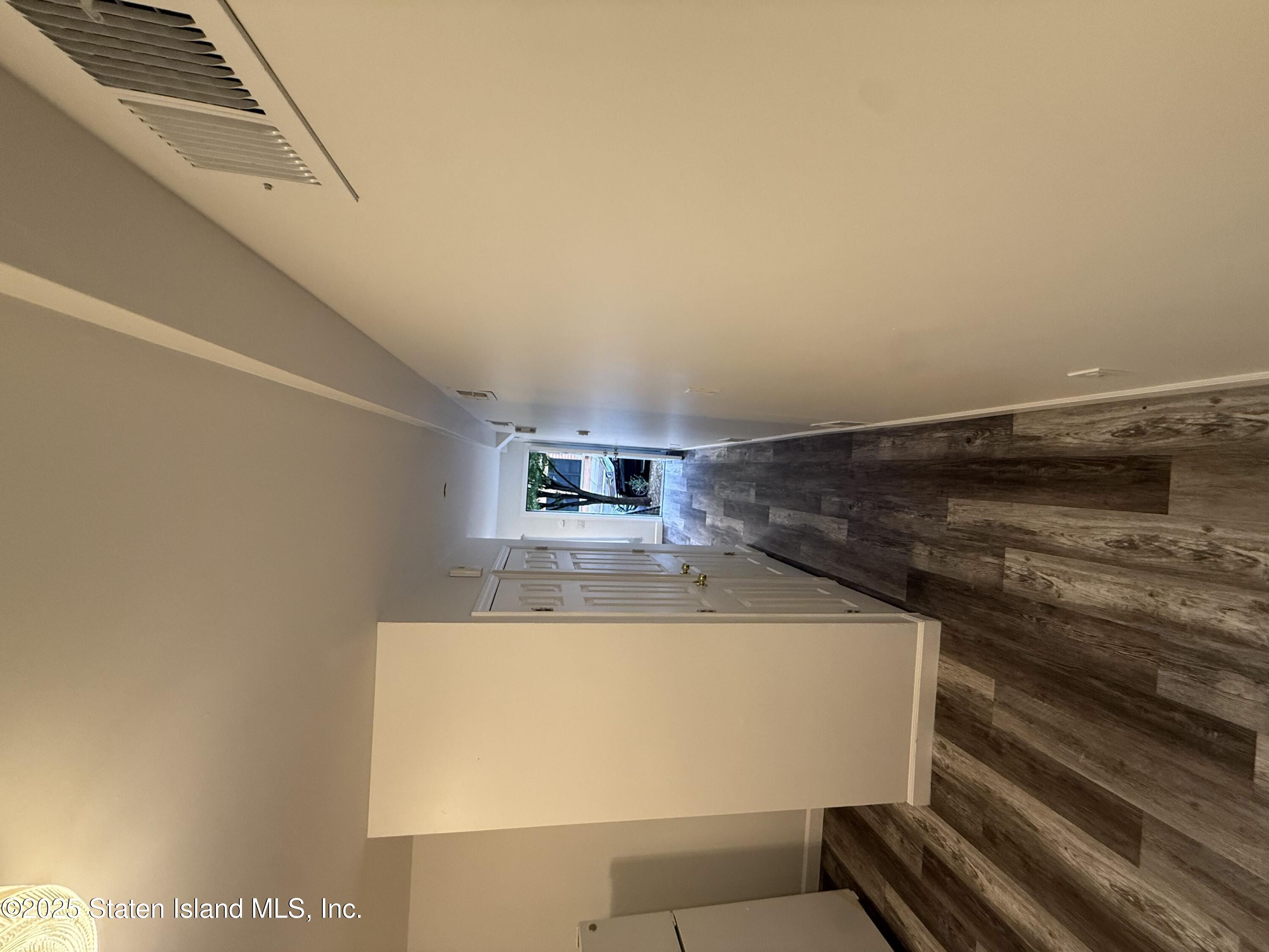 348 Targee Street Staten Island, NY 10304 - Photo 4 of 7 a view of kitchen and microwave