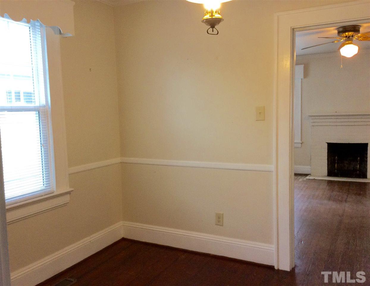 1309 Lake Wheeler Road Raleigh, NC 27603 - Photo 6 of 17 an empty room with a window