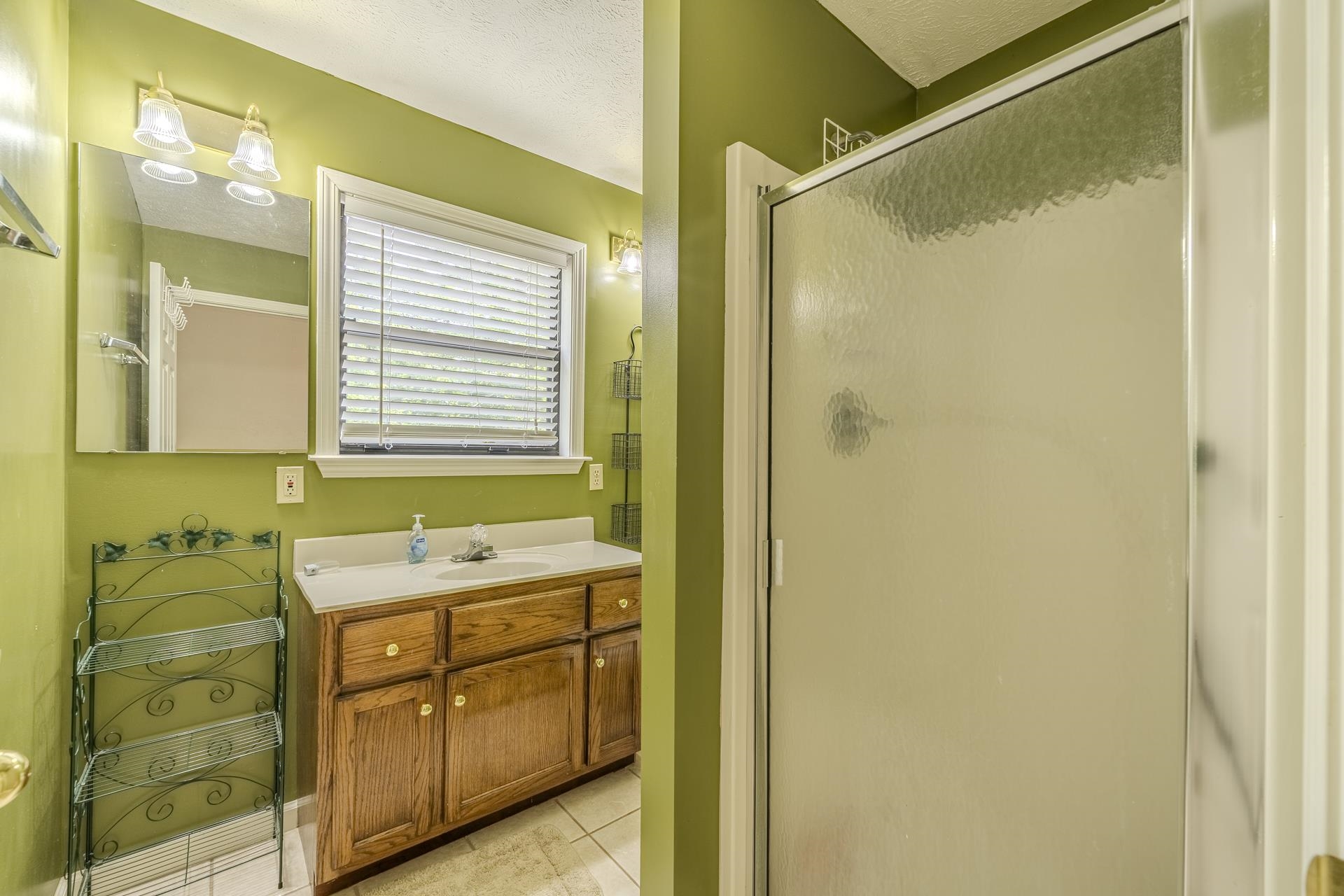 405 Murray Lane Counce, TN 38326 - Photo 29 of 36 a bathroom with a sink and a mirror