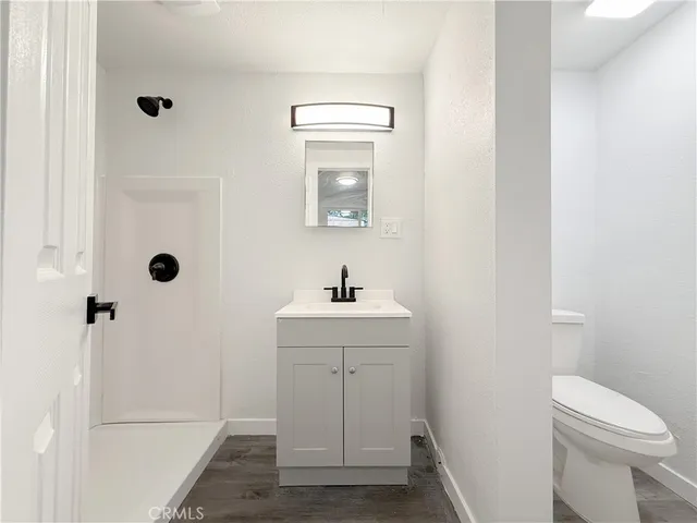 a view of a sink and a mirror