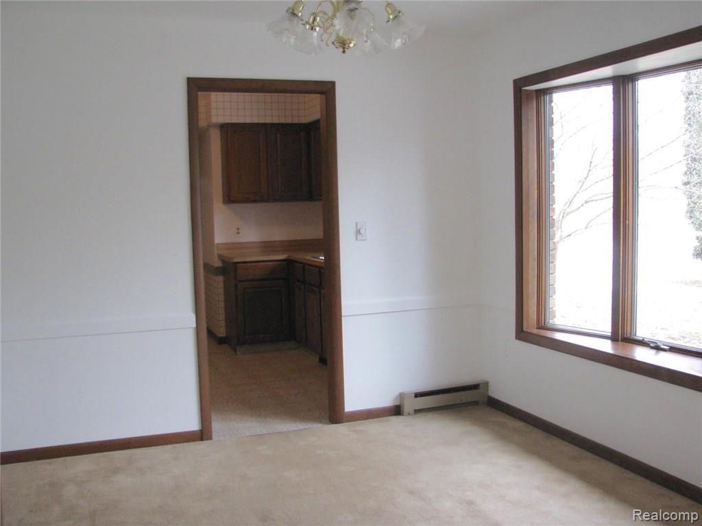 59100 Eight Mile Road South Lyon, MI 48178 - Photo 5 of 23 DINING INTO KITCHEN