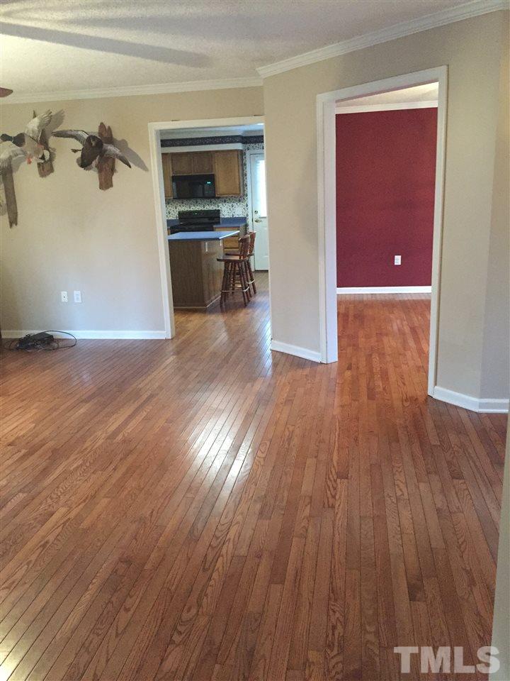 241 Shannon Road Timberlake, NC 27583 - Photo 2 of 17 a view of a living room with hardwood floor