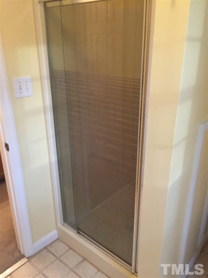 241 Shannon Road Timberlake, NC 27583 - Photo 5 of 17 a bathroom with a shower
