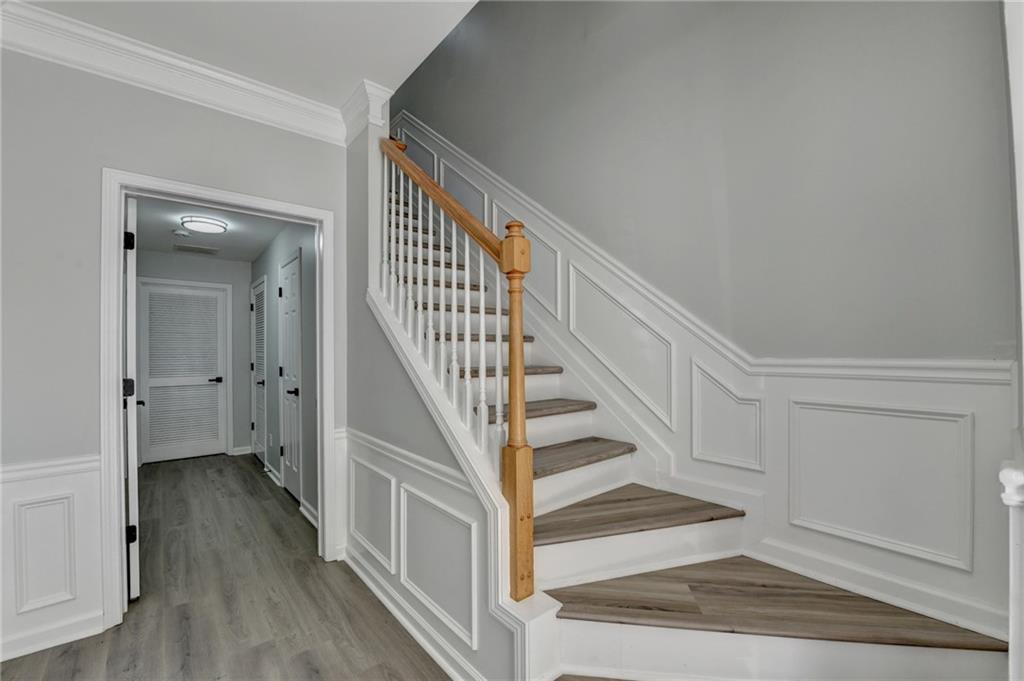3977 Howell Park Road Duluth, GA 30096 - Photo 3 of 25 a view of entryway and hall with wooden floor