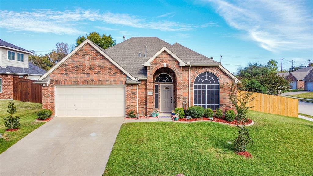 3517 Yale Drive Denton, TX 76210 - Photo 1 of 1 a front view of a house with garden