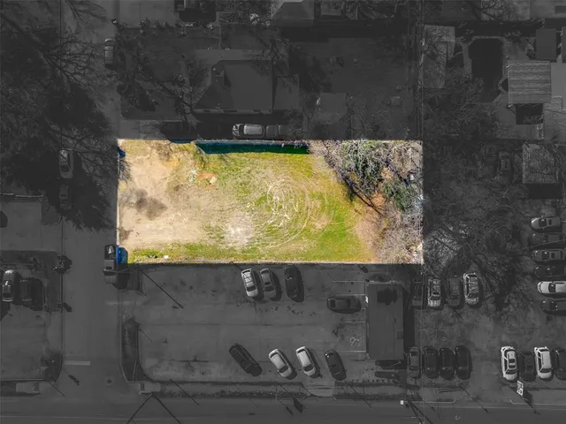 a bathroom with a granite countertop window and a sink