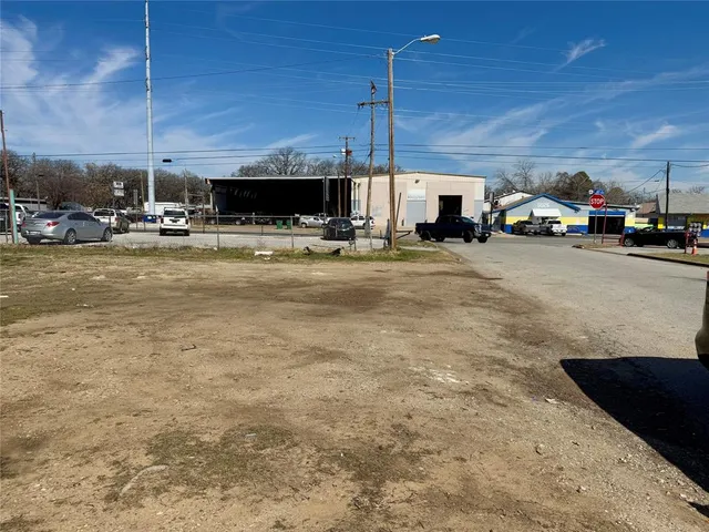 a view of a street with cars