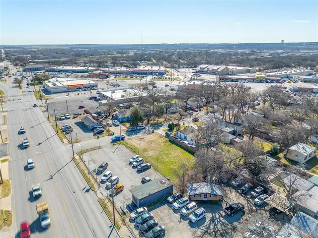 an aerial view of a city with lots of residential buildings