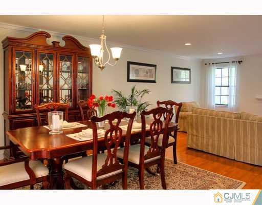 3406 Springbrook Drive Edison, NJ 08820 - Photo 4 of 10 a view of a dining room with furniture and window