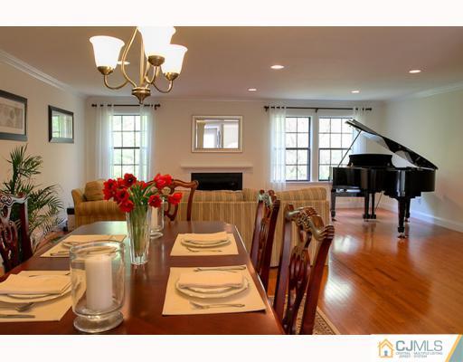 3406 Springbrook Drive Edison, NJ 08820 - Photo 6 of 10 a view of a dining room with furniture and wooden floor