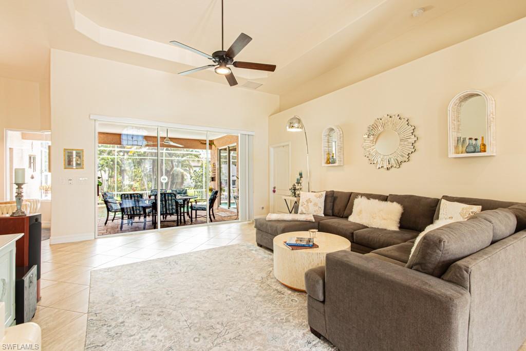 27151 Mora Road Bonita Springs, FL 34135 - Photo 17 of 50 a living room with furniture and wooden floor