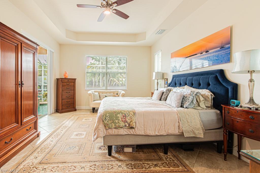 27151 Mora Road Bonita Springs, FL 34135 - Photo 20 of 50 a bedroom with a bed and a window