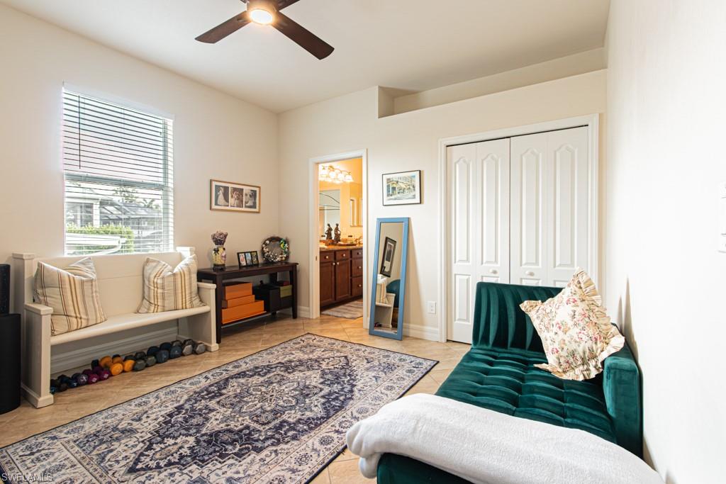 27151 Mora Road Bonita Springs, FL 34135 - Photo 26 of 50 a living room with furniture and a rug