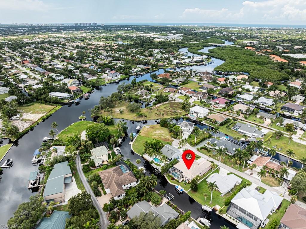 27151 Mora Road Bonita Springs, FL 34135 - Photo 3 of 50 an aerial view of residential houses with outdoor space