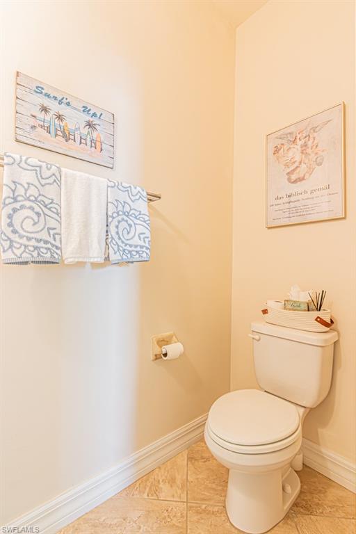 27151 Mora Road Bonita Springs, FL 34135 - Photo 37 of 50 a white toilet sitting next to a white wall