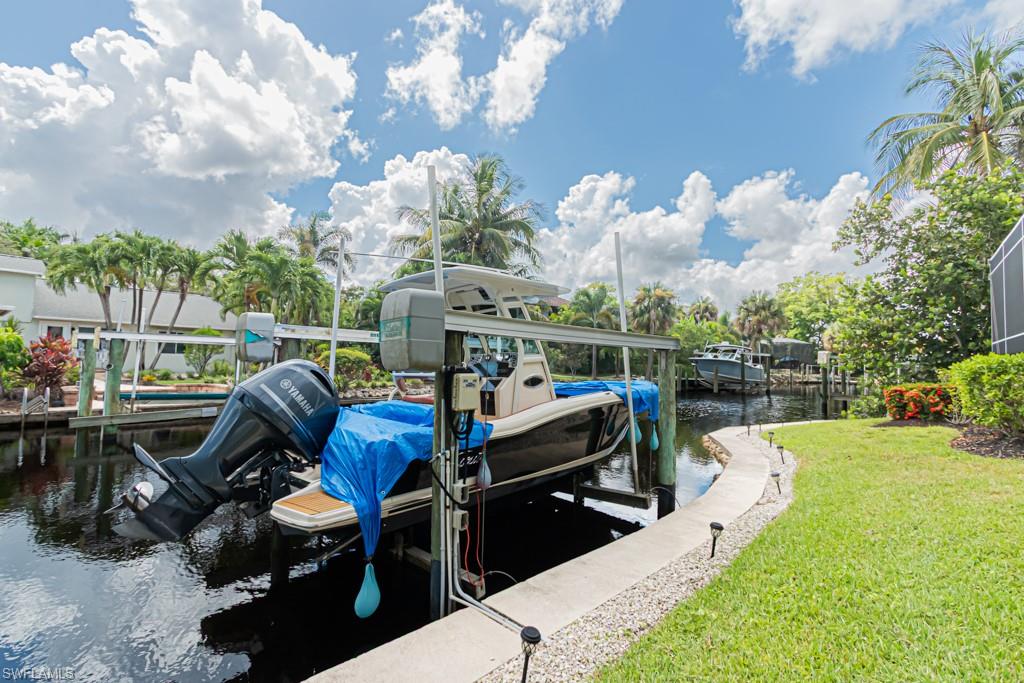27151 Mora Road Bonita Springs, FL 34135 - Photo 45 of 50 a view of a swimming pool