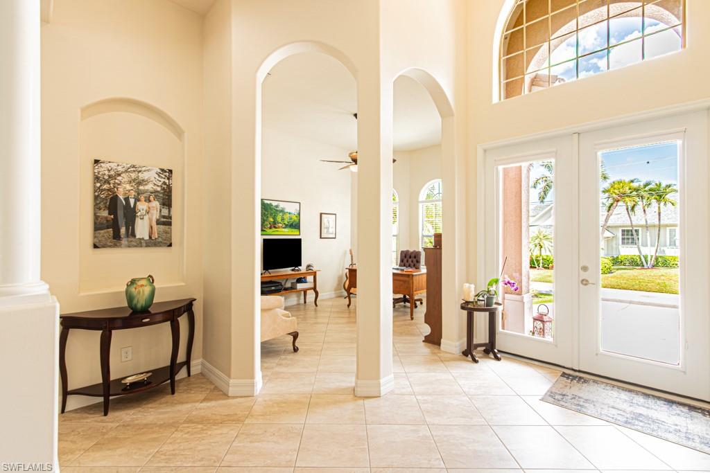 27151 Mora Road Bonita Springs, FL 34135 - Photo 5 of 50 a view of a livingroom with furniture and a dinning area
