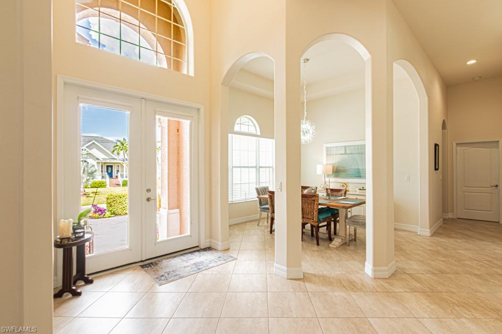 27151 Mora Road Bonita Springs, FL 34135 - Photo 6 of 50 a view of a livingroom with furniture and a dinning area