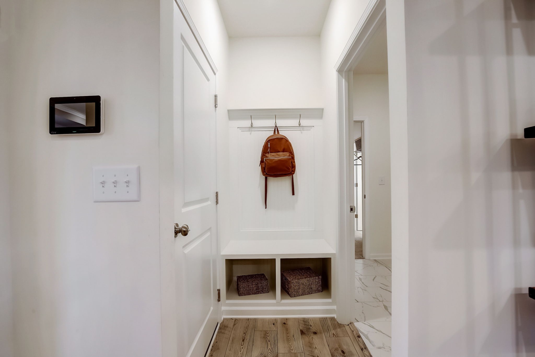 8139 Red Shiner Way Fulshear, TX 77441 - Photo 16 of 18 The Palmer- Mudroom with Bench Seat. The sample image is a staged model, to be used for illustrative purposes only. Upgrades, options, and colors will vary.