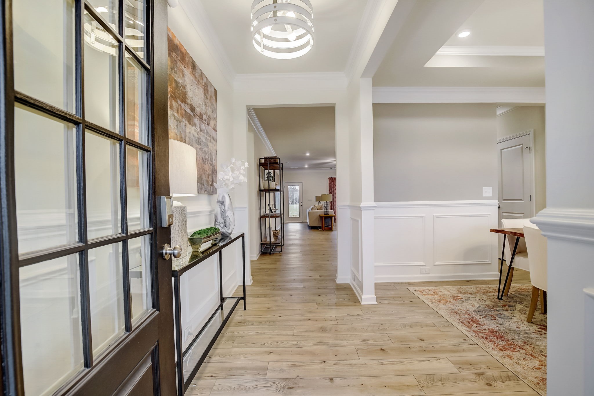 8139 Red Shiner Way Fulshear, TX 77441 - Photo 2 of 18 The Palmer- Foyer into the Dining Room. The sample image is a staged model, to be used for illustrative purposes only. Upgrades, options, and colors will vary.