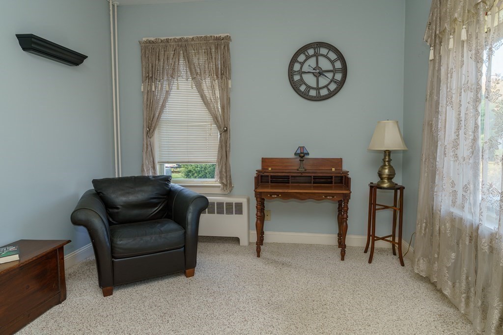177 Lawton Street Fall River, MA 02721 - Photo 11 of 26 a living room with furniture and a window