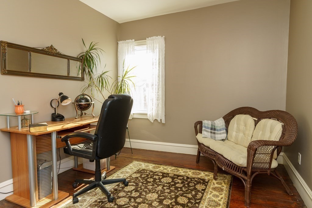 177 Lawton Street Fall River, MA 02721 - Photo 13 of 26 a living room with furniture and a window