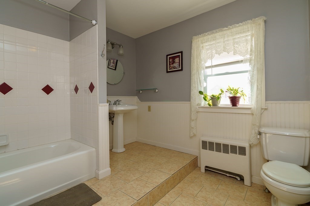 177 Lawton Street Fall River, MA 02721 - Photo 19 of 26 a bathroom with a sink toilet and bathtub
