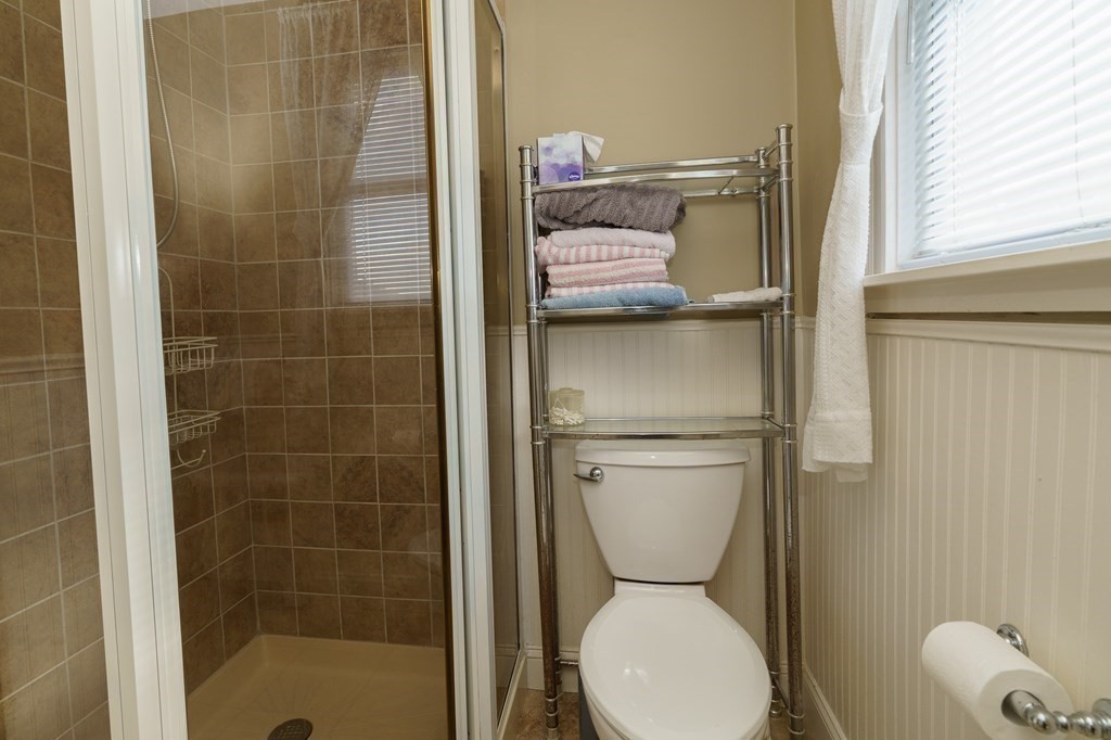 177 Lawton Street Fall River, MA 02721 - Photo 23 of 26 a bathroom with a toilet and a shower