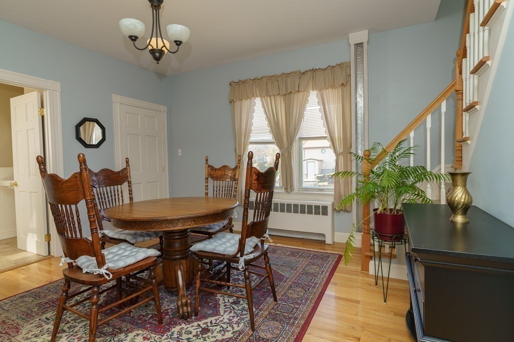 177 Lawton Street Fall River, MA 02721 - Photo 9 of 26 a view of a dining room with furniture window and wooden floor