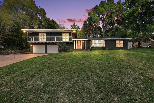front view of a house with a big yard