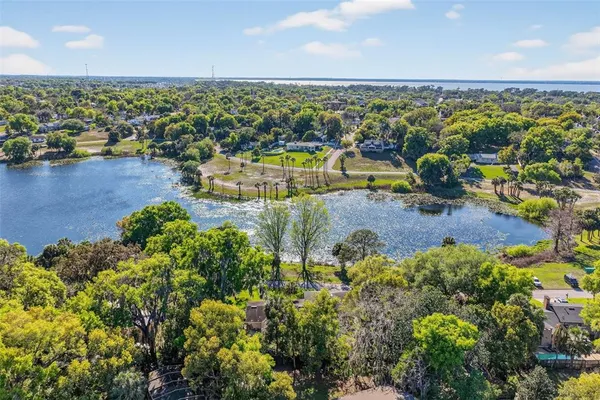 a view of a houses with a lake view