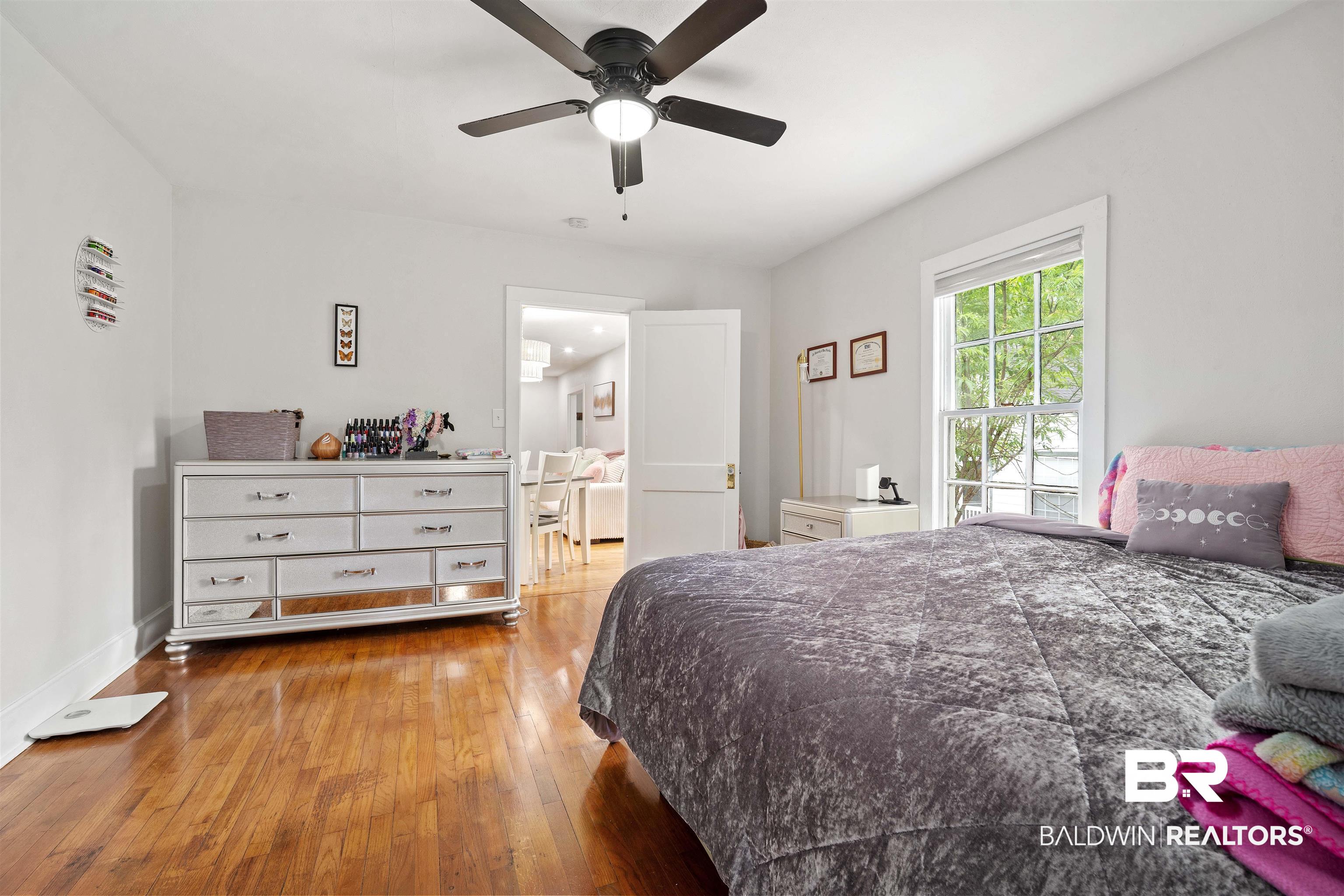 103 Emogene Place Mobile, AL 36606 - Photo 17 of 32 Bedroom with light wood-style flooring and ceiling fan