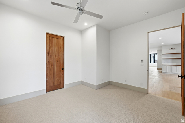 2155 East Wrangler Road Kamas, UT 84036 - Photo 26 of 62 Unfurnished room with light colored carpet, recessed lighting, and ceiling fan