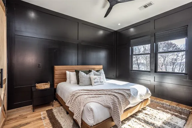 a bathroom with a shower and a sink