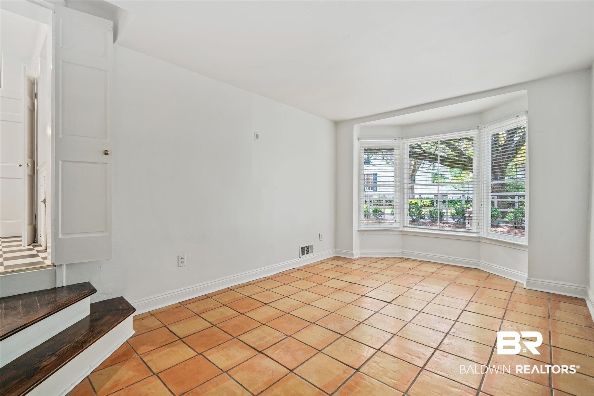 1159 Palmetto Street Mobile, AL 36604 - Photo 11 of 21 Empty room with light tile patterned flooring