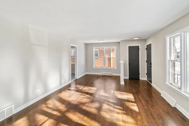 a view of an empty room and window