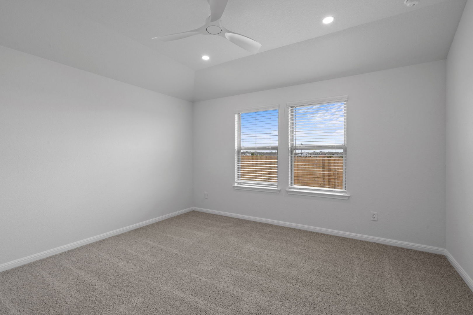 141 Hatari Trail Jarrell, TX 76537 - Photo 11 of 36 an empty room with a window