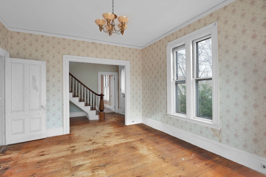 37 School Street Merrimac, MA 01860 - Photo 13 of 34 wooden floor in an empty room with a window