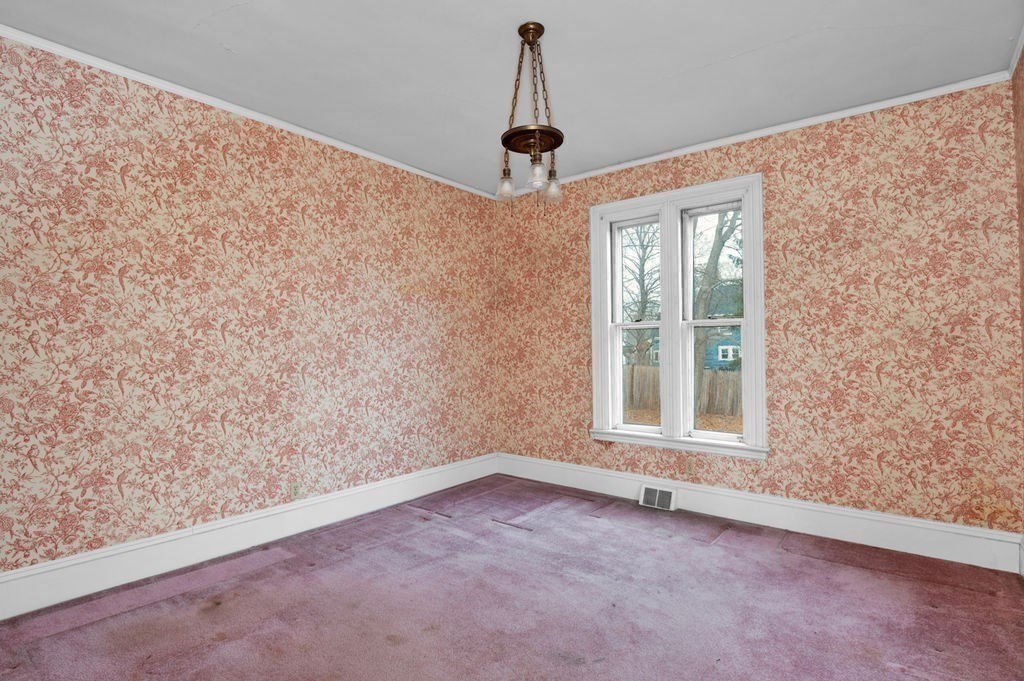 37 School Street Merrimac, MA 01860 - Photo 18 of 34 a view of an empty room with a window
