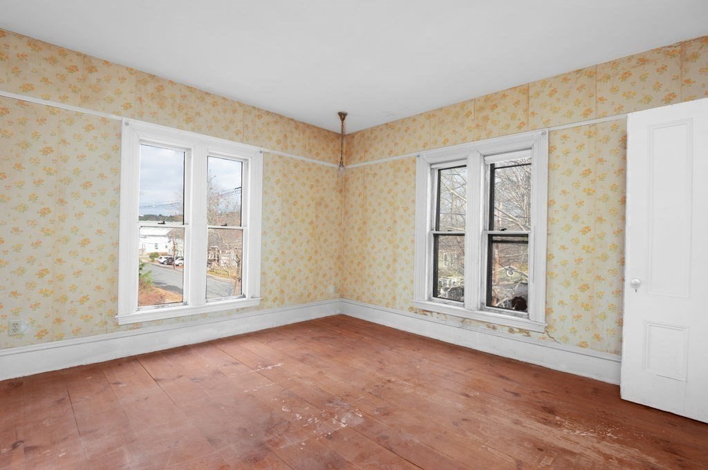 37 School Street Merrimac, MA 01860 - Photo 19 of 34 an empty room with windows and entrance