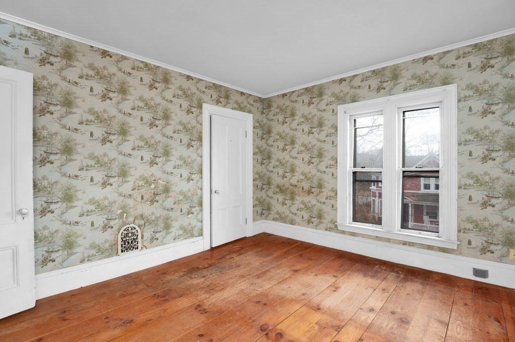 37 School Street Merrimac, MA 01860 - Photo 22 of 34 a view of empty room with window and wooden floor
