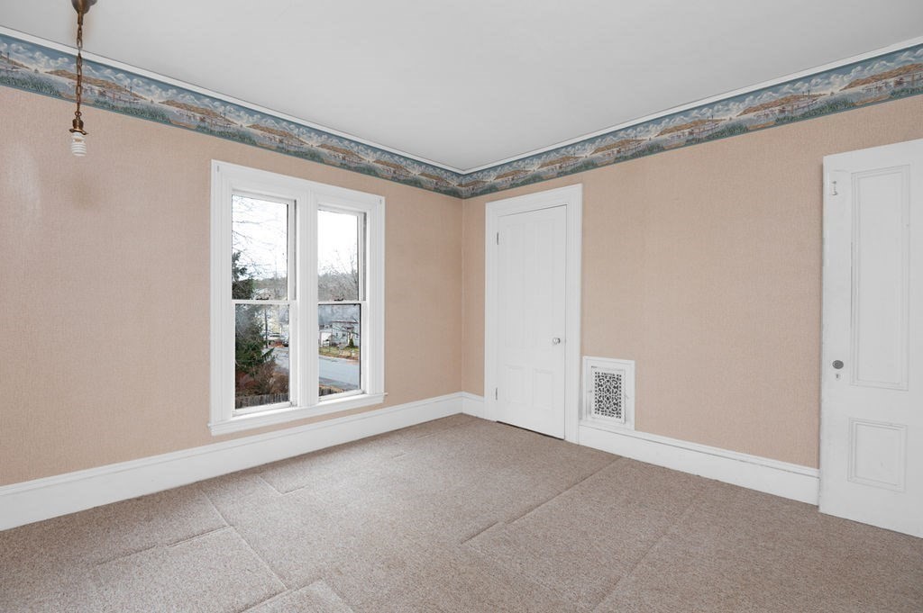 37 School Street Merrimac, MA 01860 - Photo 26 of 34 a view of an empty room with a window
