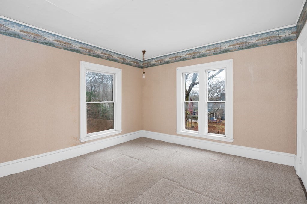 37 School Street Merrimac, MA 01860 - Photo 27 of 34 a view of an empty room with a window