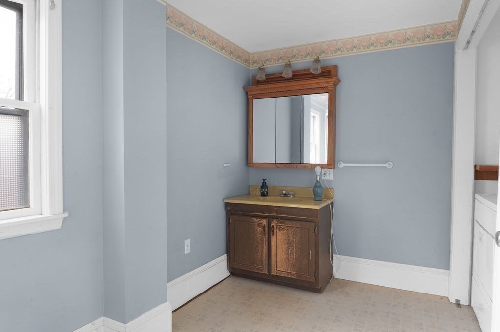 37 School Street Merrimac, MA 01860 - Photo 29 of 34 a room with a mirror and a sink