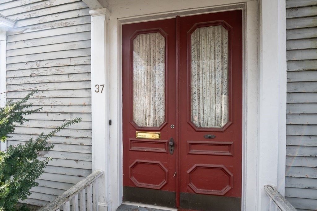 37 School Street Merrimac, MA 01860 - Photo 3 of 34 a view of front door with stairs