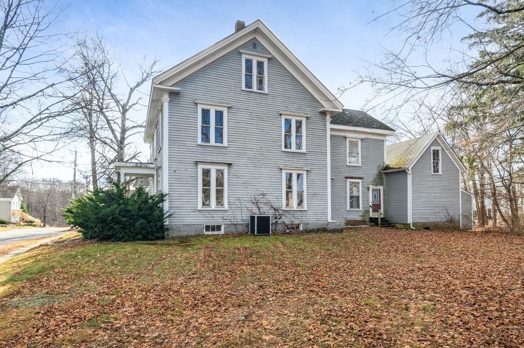 37 School Street Merrimac, MA 01860 - Photo 4 of 34 a front view of a house with a yard