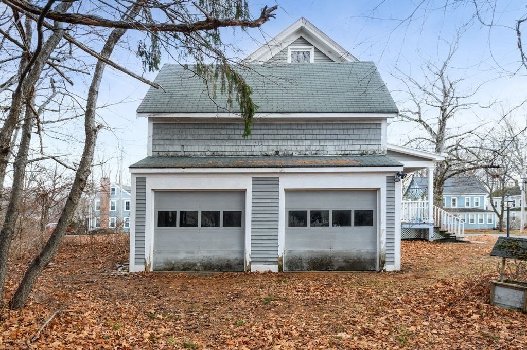 37 School Street Merrimac, MA 01860 - Photo 5 of 34 a front view of a house with a yard