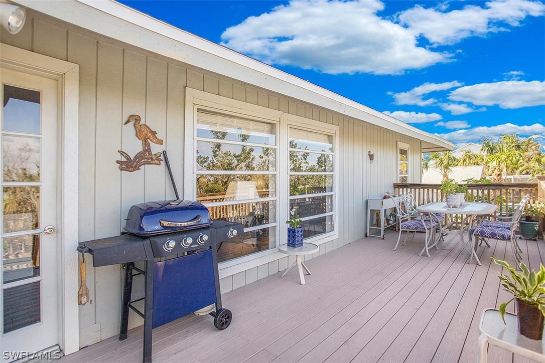 1447 Albatross Road Sanibel, FL 33957 - Photo 20 of 29 a view of workspace with wooden floor