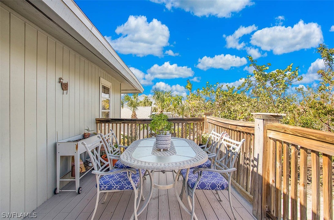 1447 Albatross Road Sanibel, FL 33957 - Photo 21 of 29 a view of a balcony with furniture