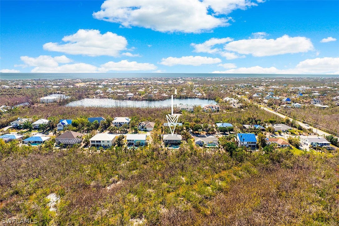 1447 Albatross Road Sanibel, FL 33957 - Photo 29 of 29 a view of a city with ocean